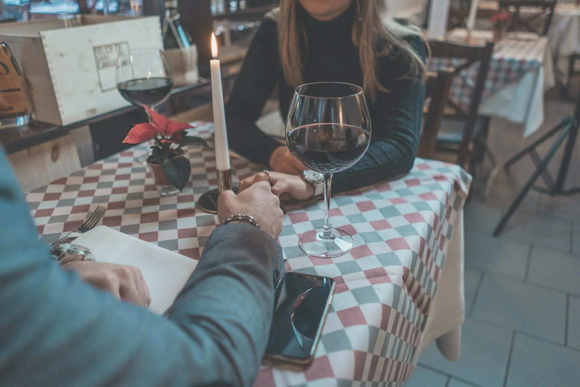 Two people on a date. This article covers 7 things no one tells you about dating in your 20s.